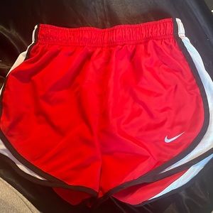 red nike shorts